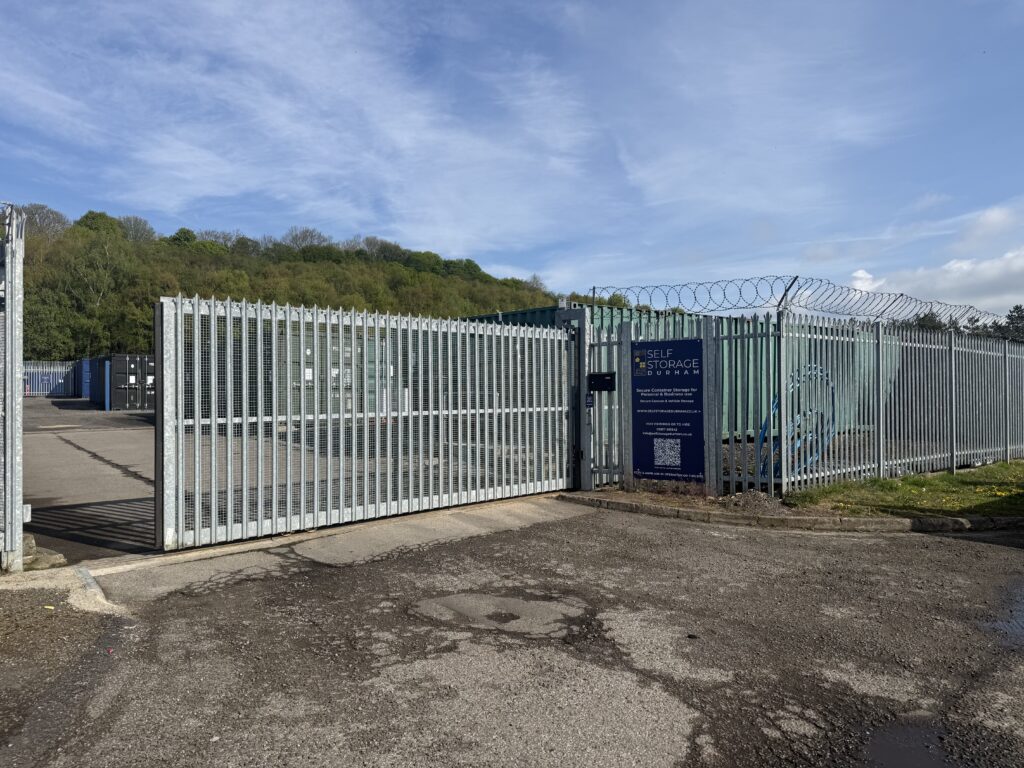 View of site from outside site where the main gate is closing